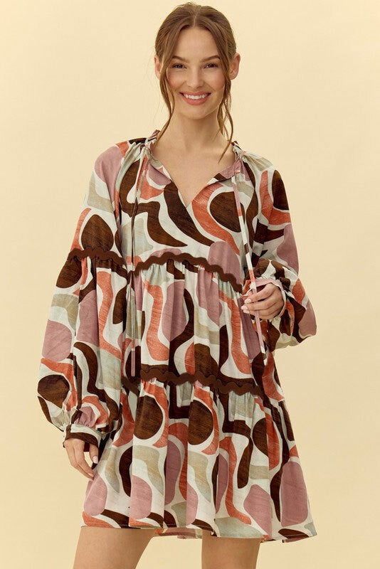 102045 Abstract Print Tassel Neck Dress